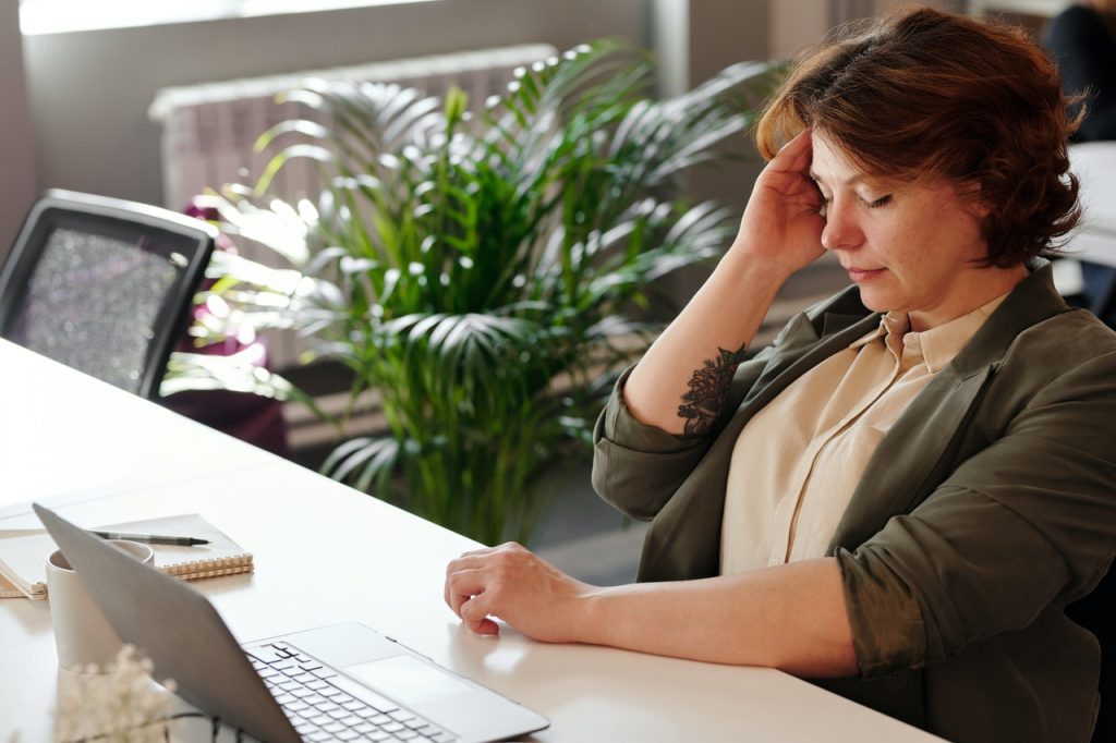 Sick staff in office working